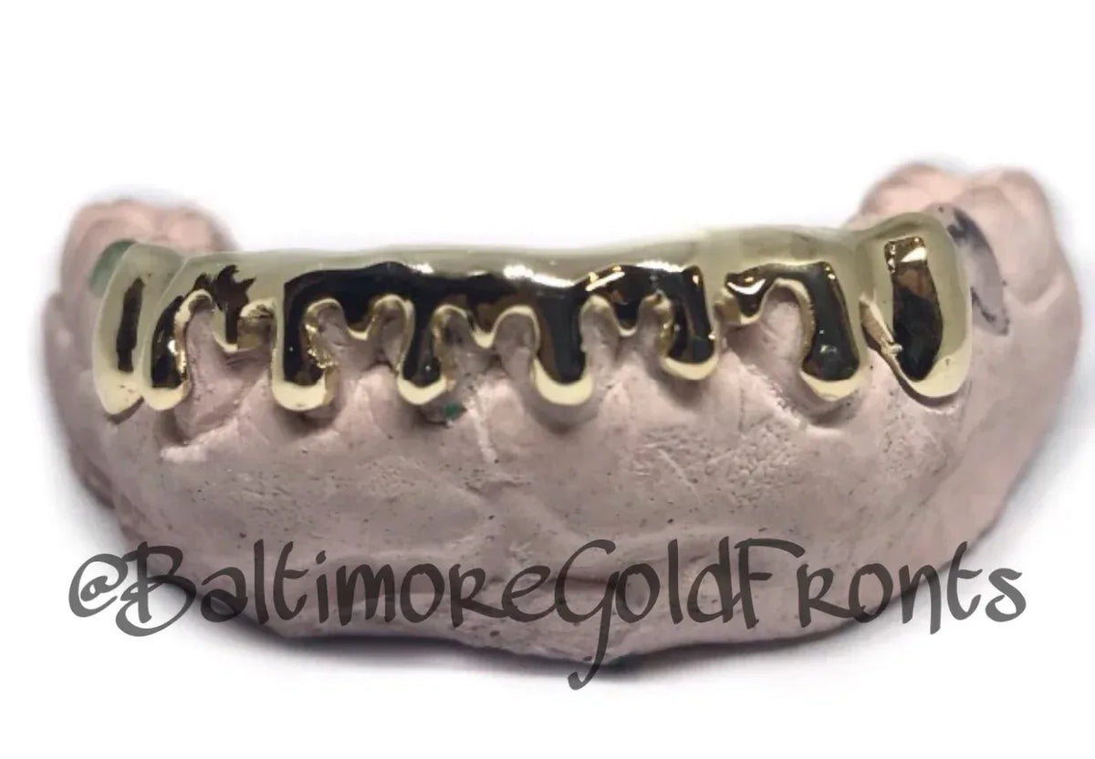 Gold Front Bar: 10k 8 Piece Drip Style Grillz  image 1